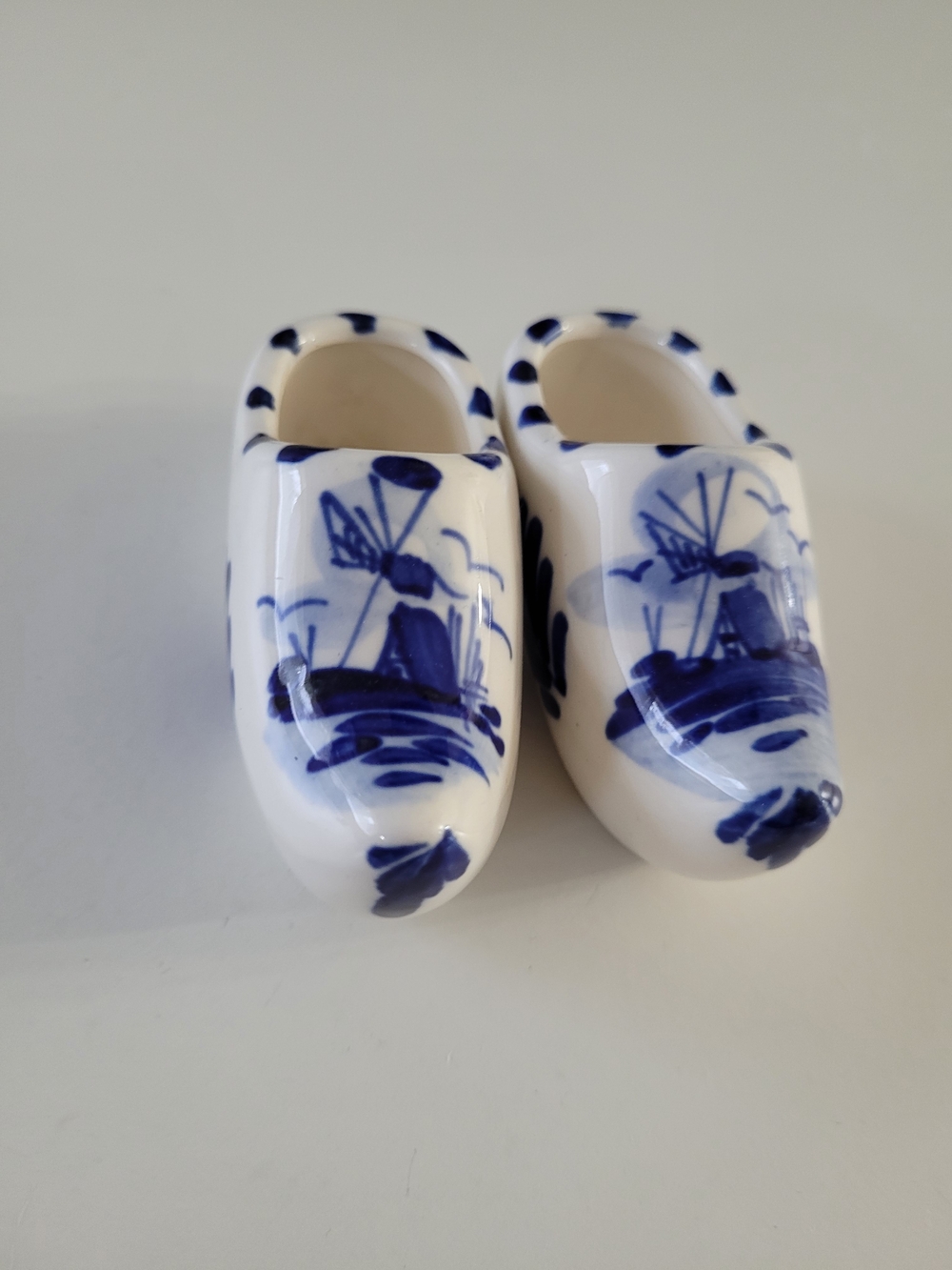 Hand-Painted White Ceramic Dutch Clogs with Blue Windmill Motif